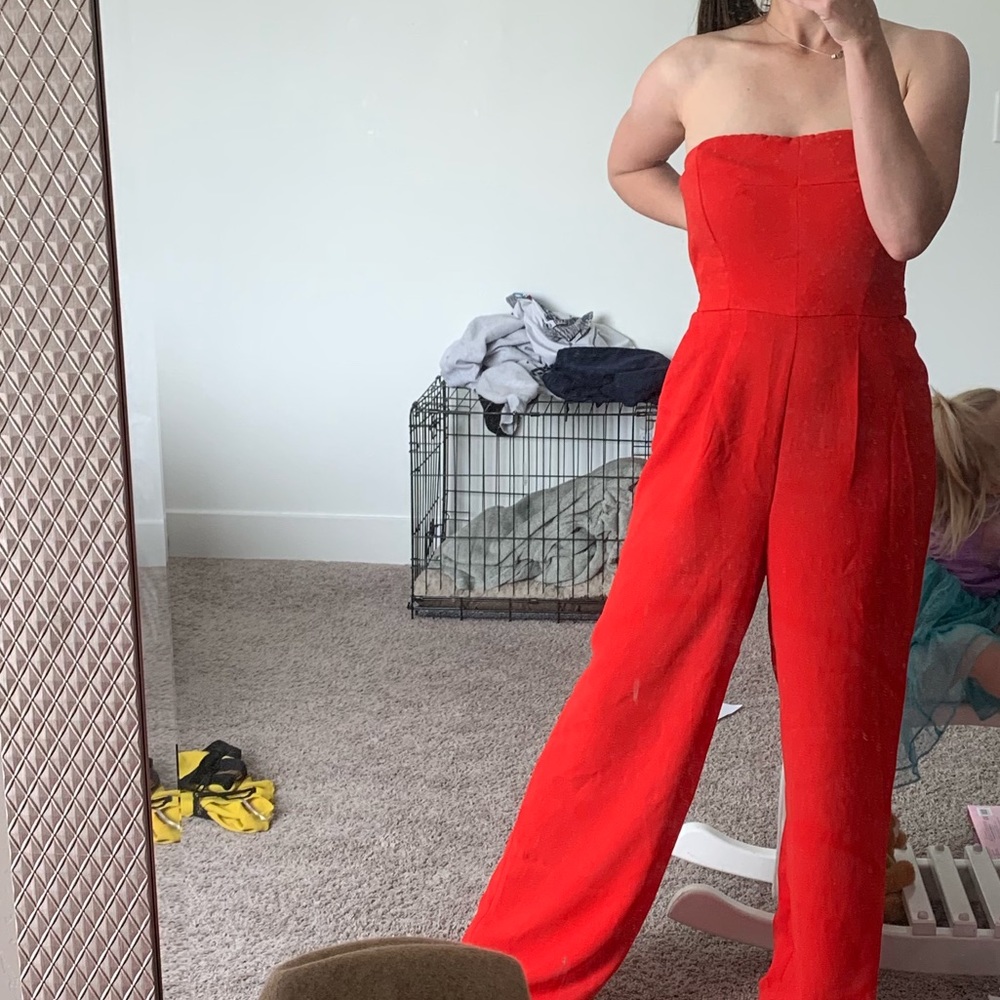 Red sleeveless jumpsuit